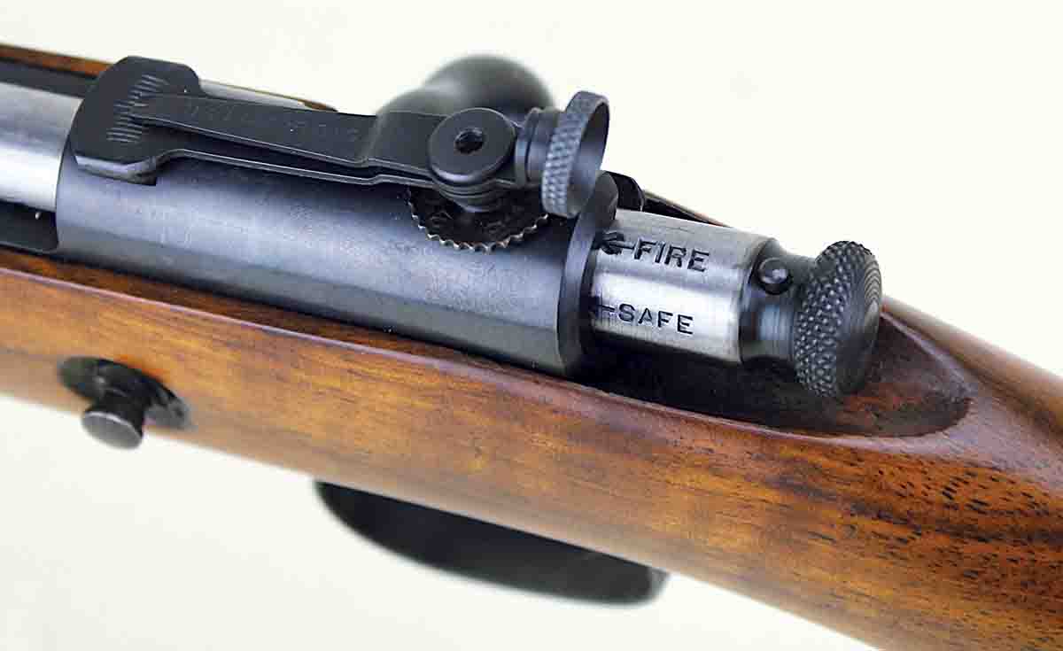 The safety on the Model 69 is incorporated into the cocking piece. The rear sight is the unusual Humeston 96-B.